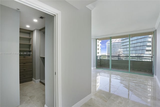 3400 SW 27th Ave Unit 1506, Miami, FL 33133 - hall featuring baseboards, marble finish floor, ornamental molding, and visible vents