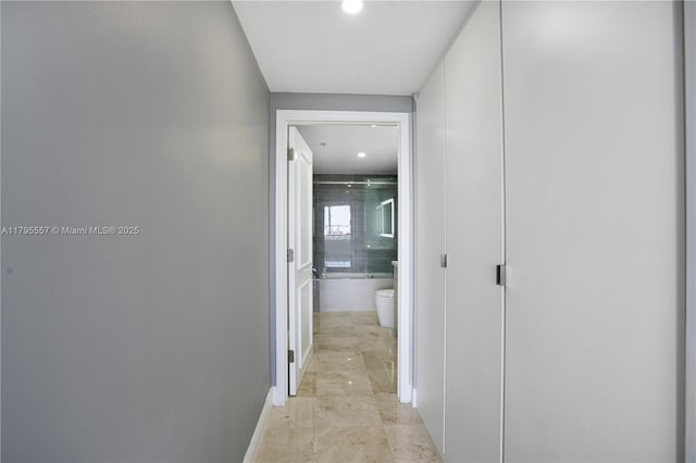 3400 SW 27th Ave Unit 1506, Miami, FL 33133 - hall with marble finish floor, baseboards, and recessed lighting