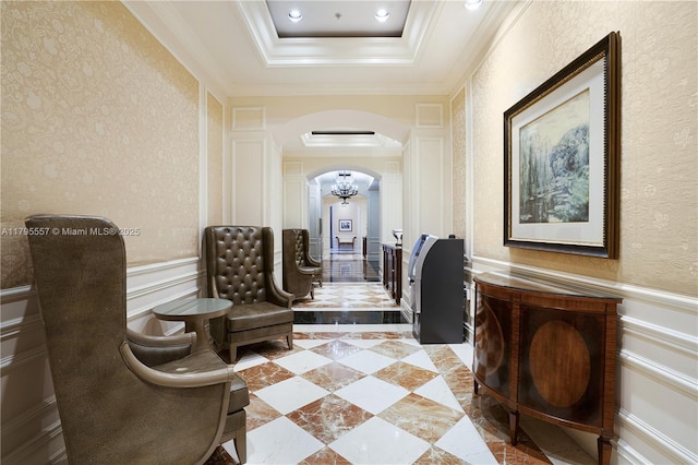 3400 SW 27th Ave Unit 1506, Miami, FL 33133 - corridor with a decorative wall, a wainscoted wall, ornamental molding, arched walkways, and a raised ceiling