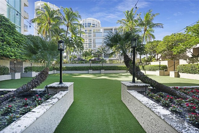 3400 SW 27th Ave Unit 1506, Miami, FL 33133 - view of property's community with a yard