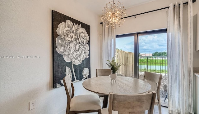 dining area with a chandelier