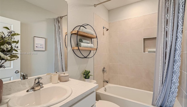 bathroom featuring shower / bathtub combination with curtain, toilet, and vanity