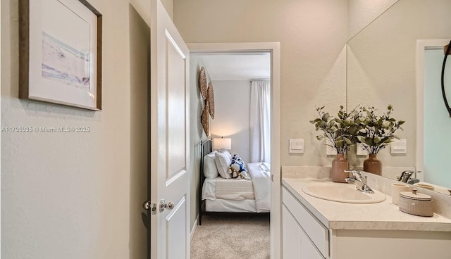 ensuite bathroom with ensuite bath and vanity