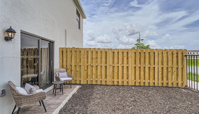 view of patio with fence