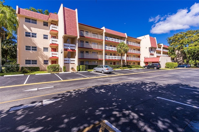 1005 Country Club Dr Unit 307, Margate, FL 33063 - view of property featuring uncovered parking