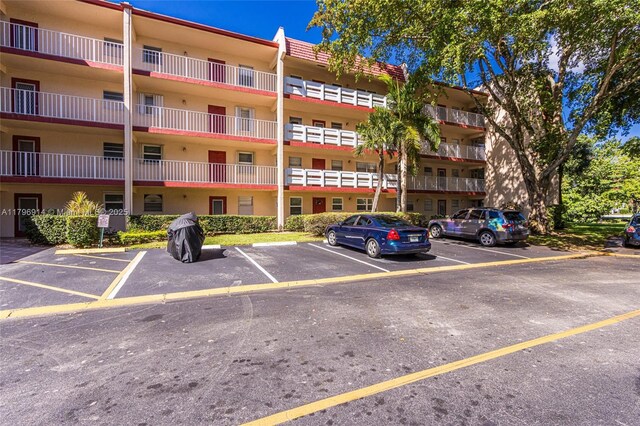 1005 Country Club Dr Unit 307, Margate, FL 33063 - view of property with uncovered parking