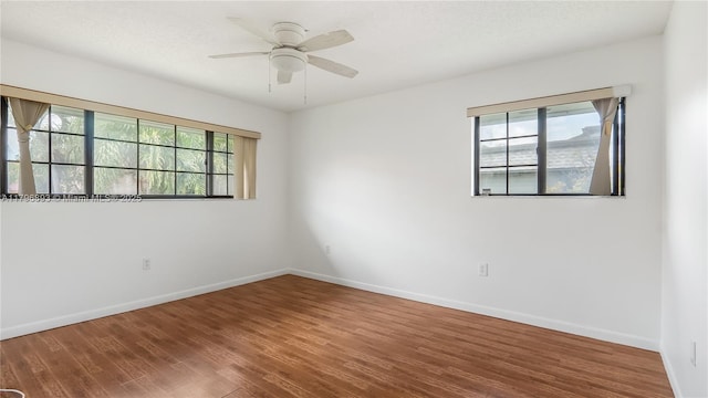 20680 NE 4th Ct Unit 206, Miami, FL 33179 - unfurnished room featuring baseboards, ceiling fan, and wood finished floors