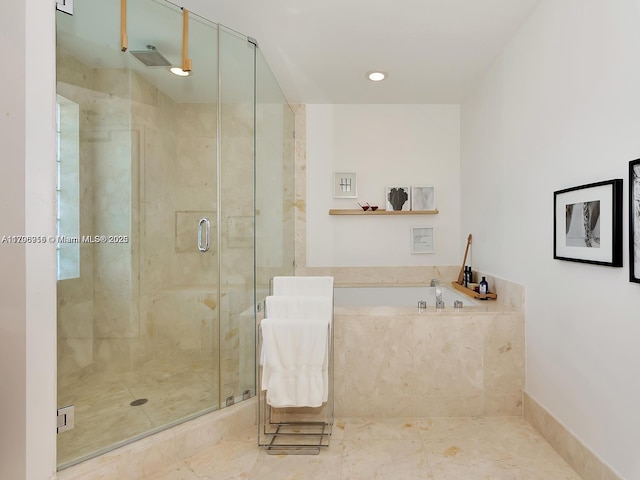 full bathroom with tile patterned flooring, a shower stall, and a bath