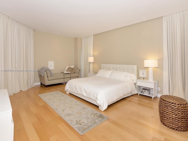 bedroom featuring wood finished floors