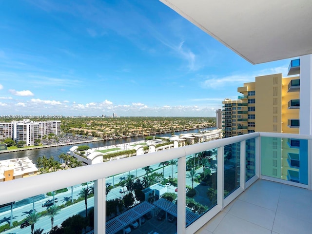 balcony featuring a water view