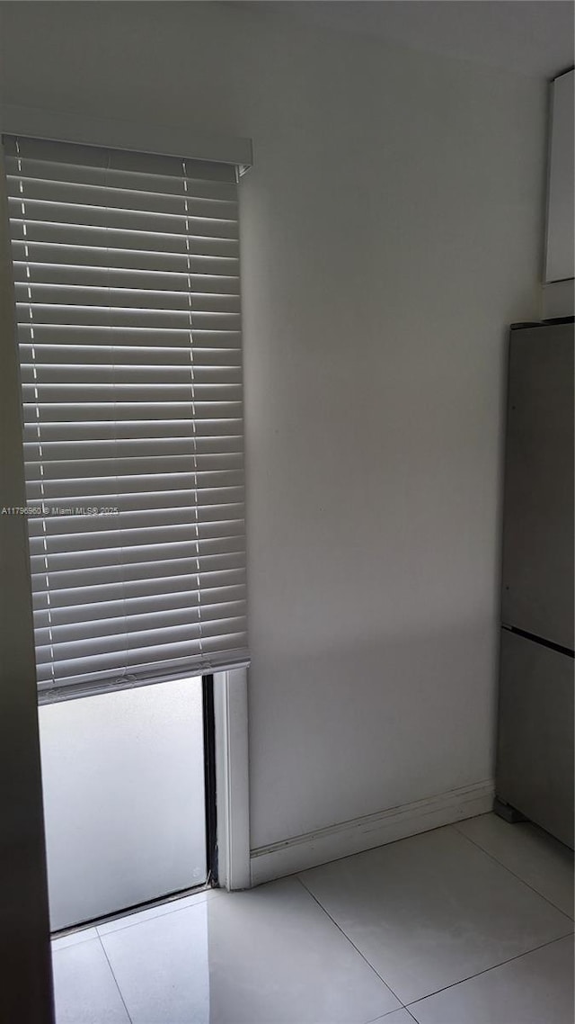 3401 N Country Club Dr Unit 410, Aventura, FL 33180 - interior details with baseboards and refrigerator