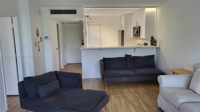 3401 N Country Club Dr Unit 410, Aventura, FL 33180 - living room with light wood-style flooring and visible vents
