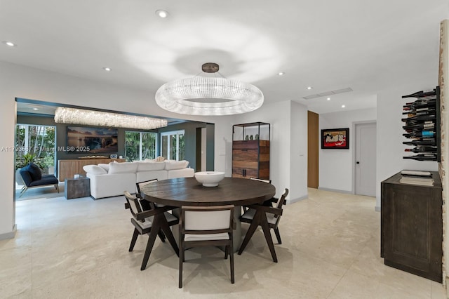 dining room featuring recessed lighting