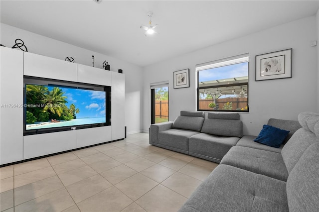 living area with light tile patterned flooring