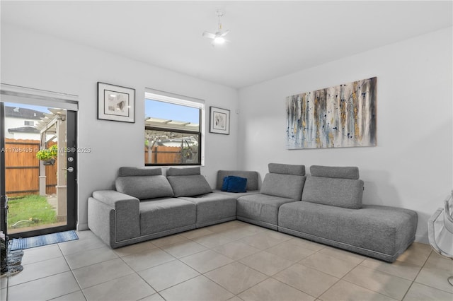 living area with light tile patterned floors