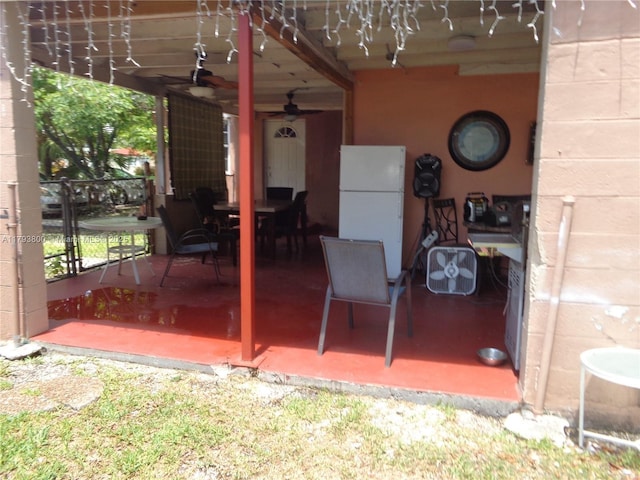 view of patio / terrace featuring ceiling fan