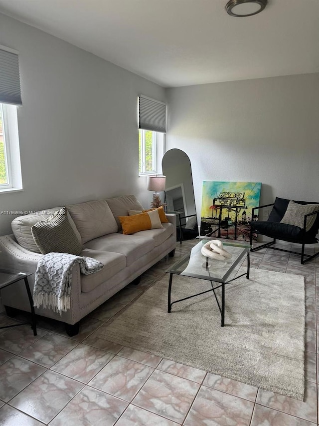 living area featuring arched walkways
