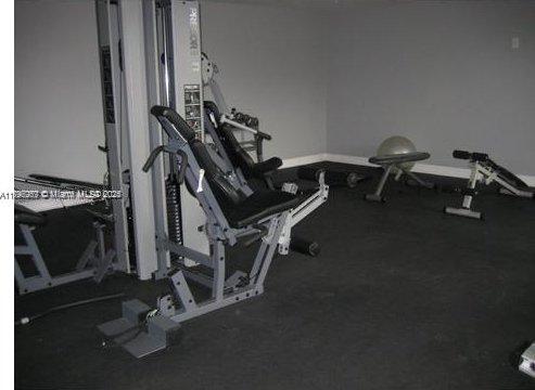 215 SW 42nd Ave Unit 905, Miami, FL 33134 - exercise room featuring baseboards