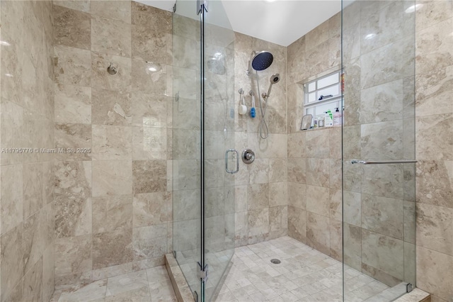 full bath with a shower stall