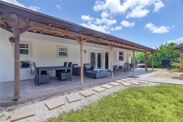 view of patio with an outdoor hangout area and french doors