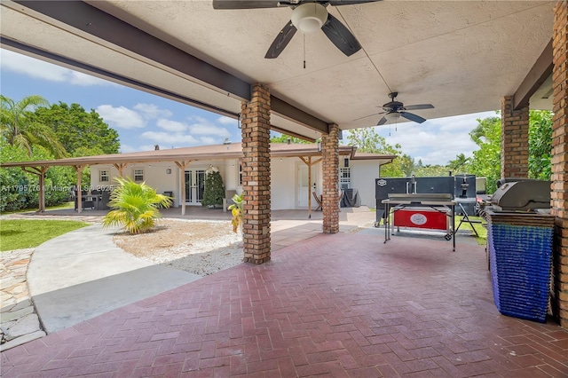 view of patio featuring a ceiling fan and french doors
