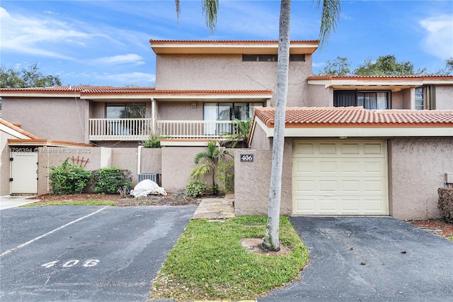 406 Saint Andrews Rd Unit 53, Hollywood, FL 33021 - view of property with a tiled roof and stucco siding