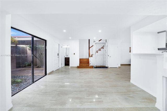 406 Saint Andrews Rd Unit 53, Hollywood, FL 33021 - unfurnished living room featuring baseboards, stairway, and recessed lighting
