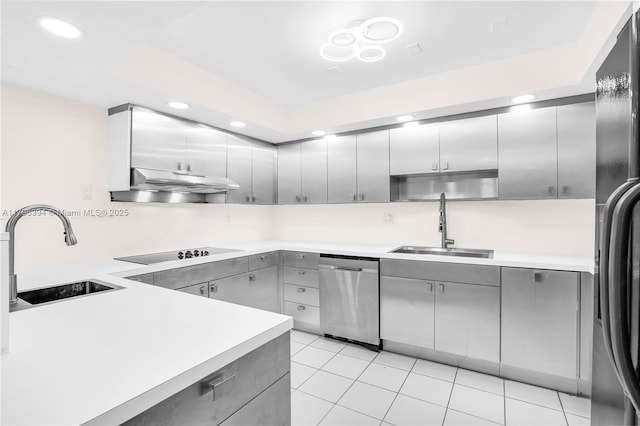 406 Saint Andrews Rd Unit 53, Hollywood, FL 33021 - kitchen with under cabinet range hood, a sink, black appliances, and gray cabinets