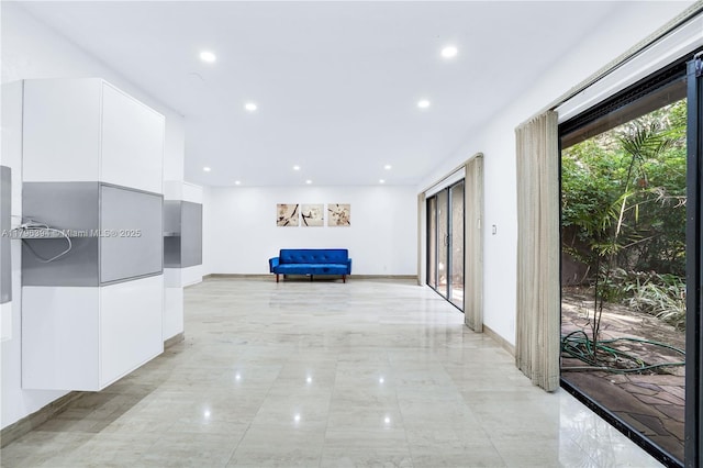 406 Saint Andrews Rd Unit 53, Hollywood, FL 33021 - corridor featuring baseboards, marble finish floor, and recessed lighting