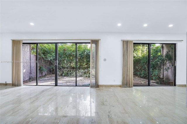 406 Saint Andrews Rd Unit 53, Hollywood, FL 33021 - spare room with baseboards, plenty of natural light, and recessed lighting