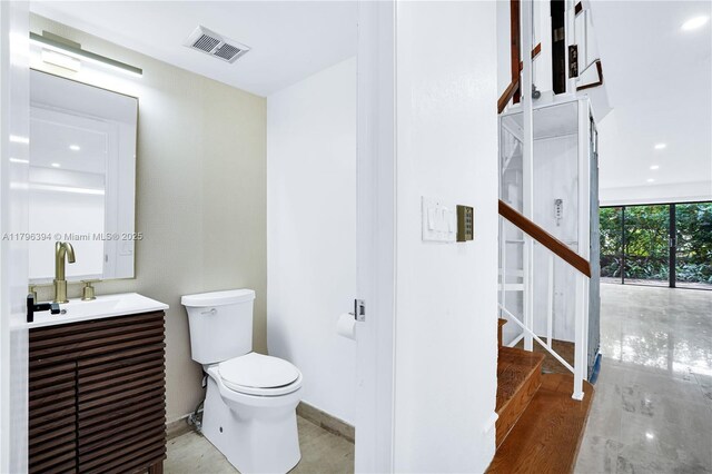 406 Saint Andrews Rd Unit 53, Hollywood, FL 33021 - half bath featuring vanity, toilet, and visible vents