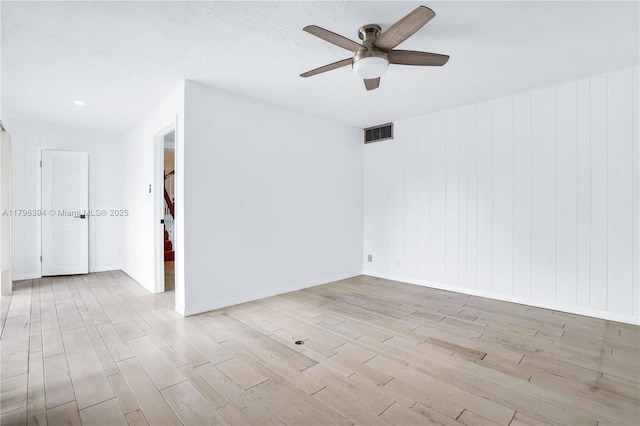 406 Saint Andrews Rd Unit 53, Hollywood, FL 33021 - unfurnished room with baseboards, ceiling fan, visible vents, and wood finished floors
