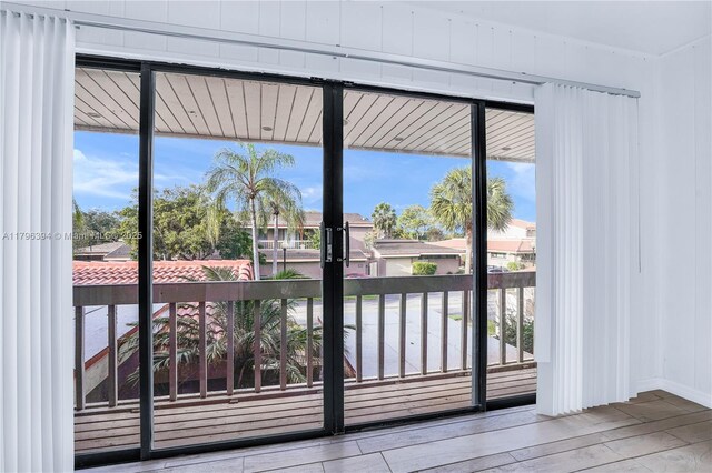 406 Saint Andrews Rd Unit 53, Hollywood, FL 33021 - doorway to outside featuring hardwood / wood-style flooring