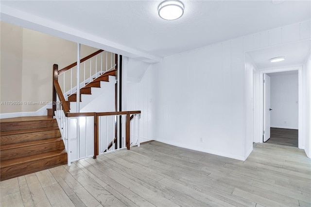 406 Saint Andrews Rd Unit 53, Hollywood, FL 33021 - unfurnished room featuring baseboards, stairs, and wood finished floors
