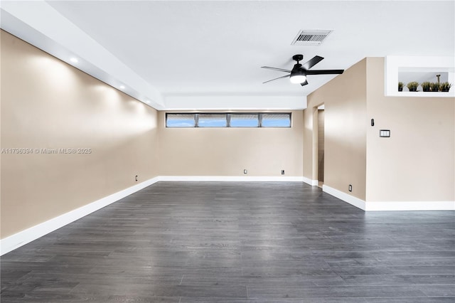 406 Saint Andrews Rd Unit 53, Hollywood, FL 33021 - spare room featuring a ceiling fan, baseboards, dark wood finished floors, and visible vents
