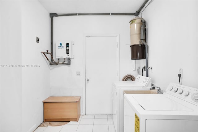 406 Saint Andrews Rd Unit 53, Hollywood, FL 33021 - washroom featuring light tile patterned floors, laundry area, and independent washer and dryer