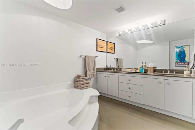 2000 Towerside Ter Unit 710, Miami, FL 33138 - full bathroom featuring double vanity, a bath, and concrete floors