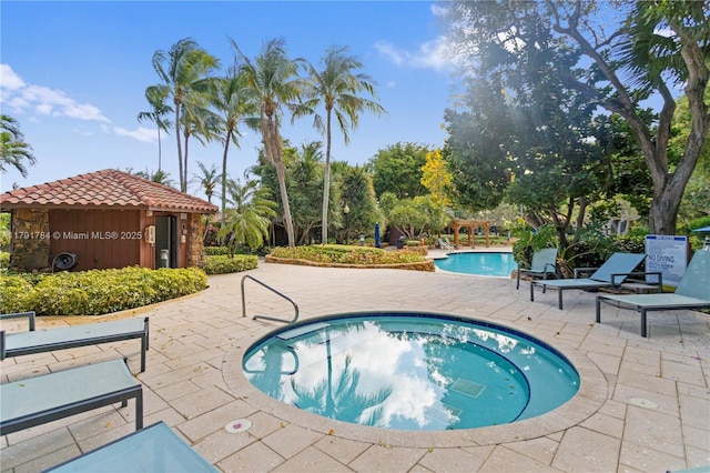 2000 Towerside Ter Unit 710, Miami, FL 33138 - community pool with a community hot tub and a patio area