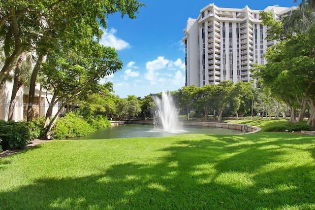 2000 Towerside Ter Unit 710, Miami, FL 33138 - view of property's community featuring a water view and a lawn