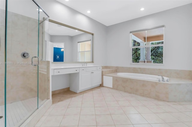 3040 NW 126th Ave, Sunrise, FL 33323 - bathroom featuring vanity, a garden tub, a shower stall, tile patterned floors, and recessed lighting
