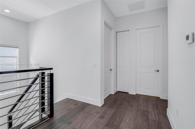 3040 NW 126th Ave, Sunrise, FL 33323 - hallway with dark wood-style flooring, baseboards, and recessed lighting
