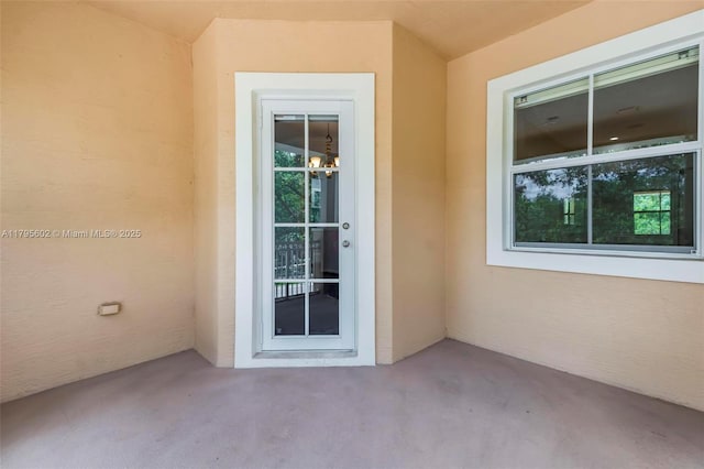 3040 NW 126th Ave, Sunrise, FL 33323 - entrance to property featuring stucco siding and a patio area