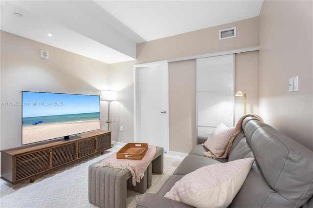 cinema room with baseboards and visible vents
