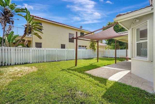 view of yard featuring a patio area and a fenced backyard