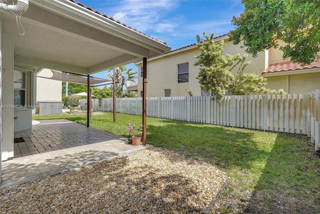 view of yard featuring a patio and fence private yard