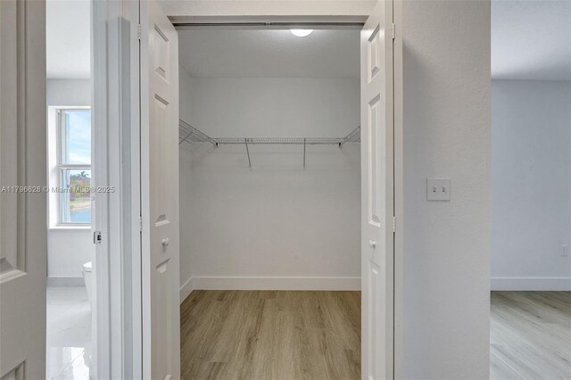 16276 SW 29th St, Miramar, FL 33027 - walk in closet with wood finished floors