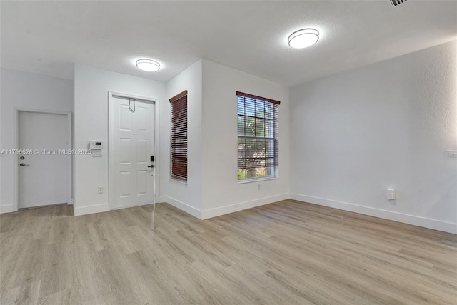 16276 SW 29th St, Miramar, FL 33027 - entryway featuring light wood-style floors and baseboards