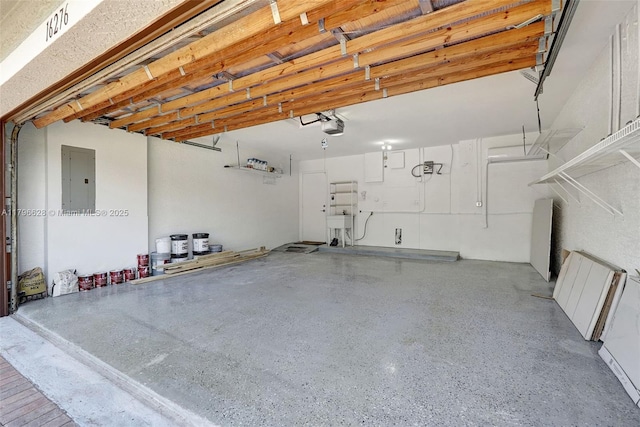garage with electric panel, radiator heating unit, and a garage door opener