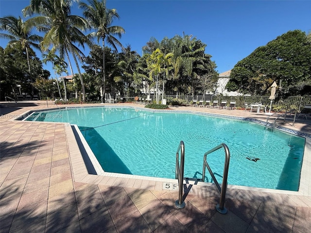 16276 SW 29th St, Miramar, FL 33027 - community pool featuring a patio