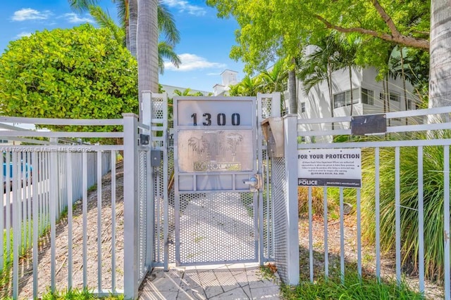 1300 Pennsylvania Ave Unit 104, Miami Beach, FL 33139 - view of gate featuring fence
